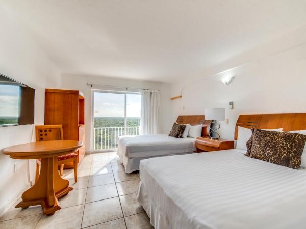 Coral Princess Hotel & Dive Resort : photo 5 de la chambre hébergement superior jungle adventure 2 lits doubles