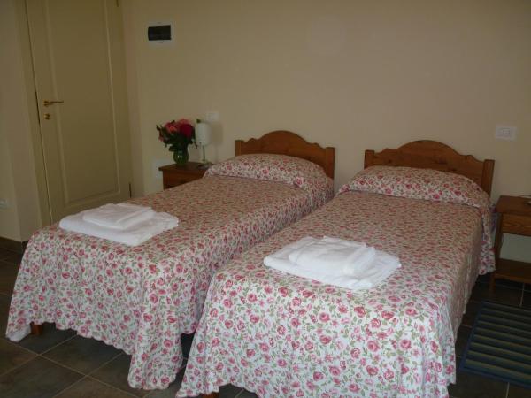 Agriturismo Corte Carolina : photo 1 de la chambre chambre lits jumeaux