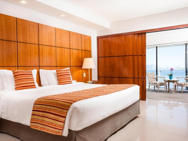 Rio Othon Palace : photo 9 de la chambre chambre lit king-size - vue sur mer