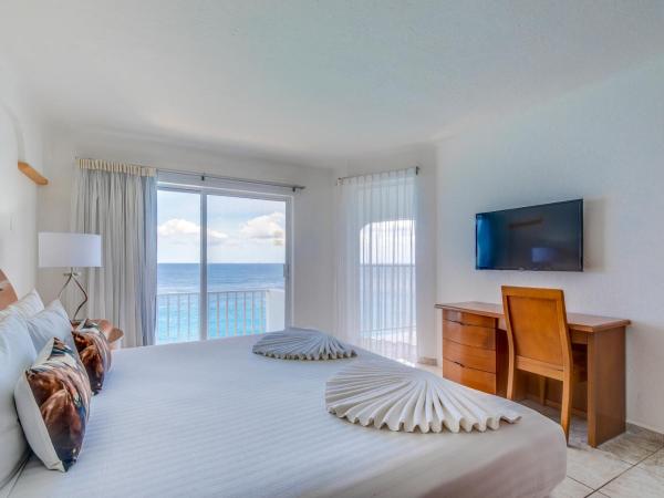 Coral Princess Hotel & Dive Resort : photo 4 de la chambre suite 1 chambre avec lit king-size - côté océan