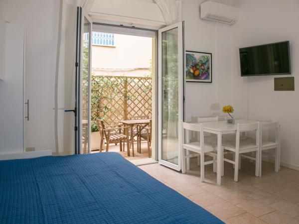 Residence Villa Ofelia : photo 4 de la chambre appartement 1 chambre avec terrasse privée - rez-de-chaussée (5 adultes)