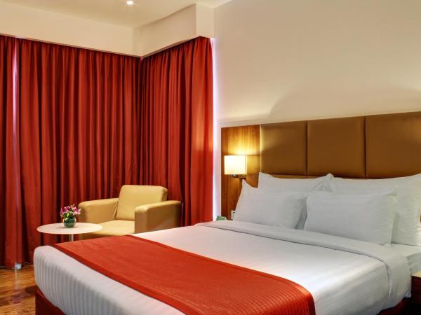Ramada Encore Domlur Bangalore : photo 5 de la chambre chambre lit queen-size deluxe