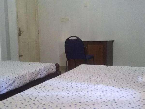 Juliet's Homestay : photo 10 de la chambre chambre double standard avec ventilateur