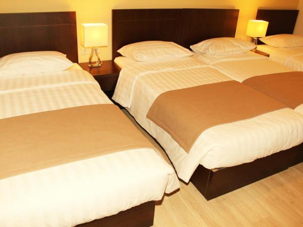 Rea Hotel : photo 2 de la chambre chambre quadruple standard