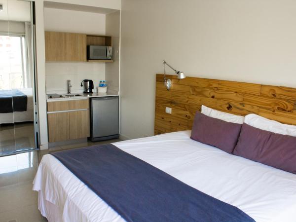 Lemon Suites : photo 1 de la chambre chambre double ou lits jumeaux avec salle de bains