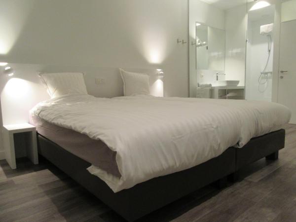 Hotel Muske Pitter : photo 1 de la chambre chambre lits jumeaux de luxe avec kitchenette