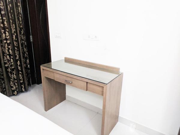 Clyford Suites : photo 3 de la chambre appartement avec balcon