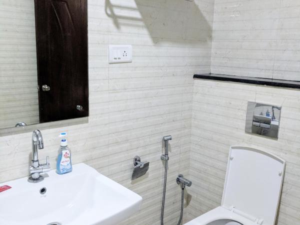 Clyford Suites : photo 8 de la chambre appartement avec balcon