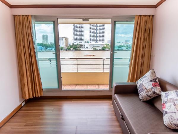 New Siam Riverside - SHA Certified : photo 3 de la chambre suite avec lit double - vue sur rivière