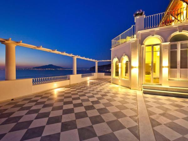 Villa Silvana Relais : photo 2 de la chambre suite lit king-size - vue sur mer