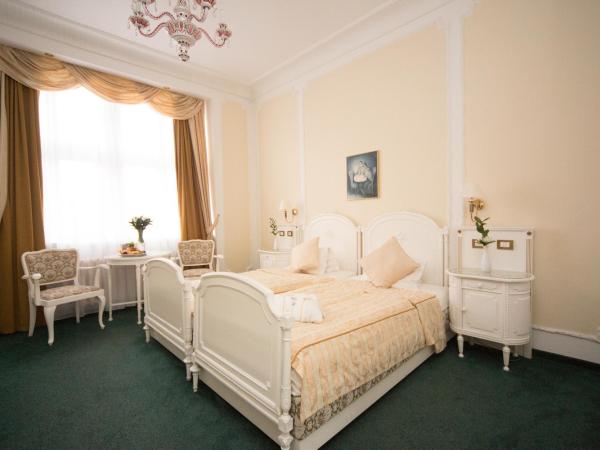 Ambassador Zlata Husa : photo 2 de la chambre chambre lits jumeaux