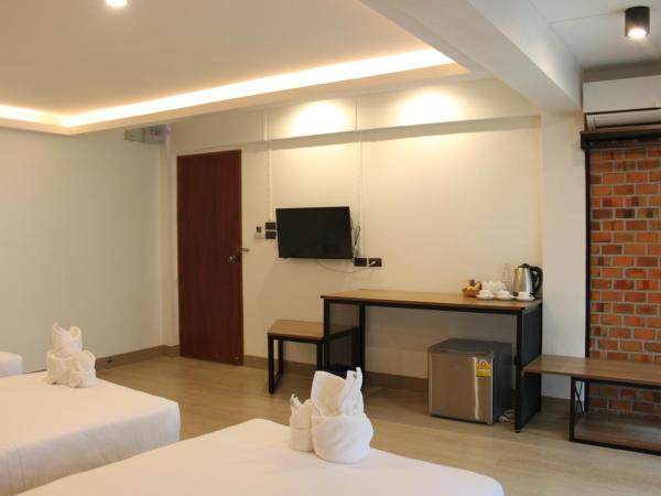 The Old City Wall Inn : photo 2 de la chambre chambre triple supérieure