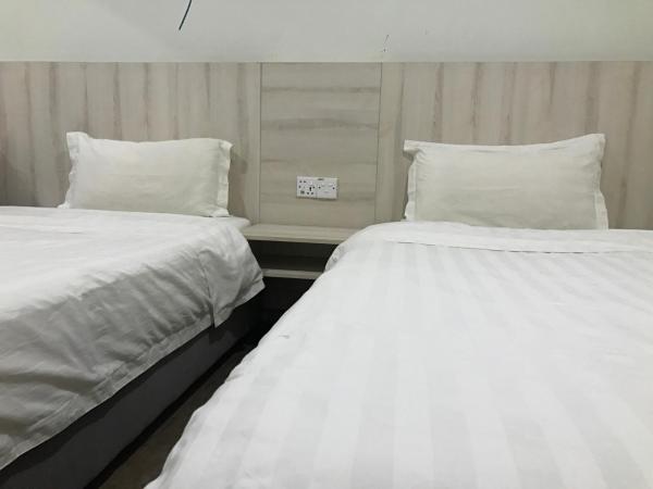 Tambun Inn Hotel : photo 2 de la chambre twin deluxe room (no window)