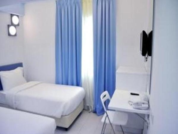 YY318 Hotel Bukit Bintang : photo 3 de la chambre chambre lits jumeaux deluxe