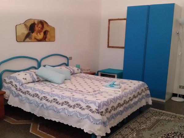 MyDre@mSavona : photo 2 de la chambre chambre double ou lits jumeaux