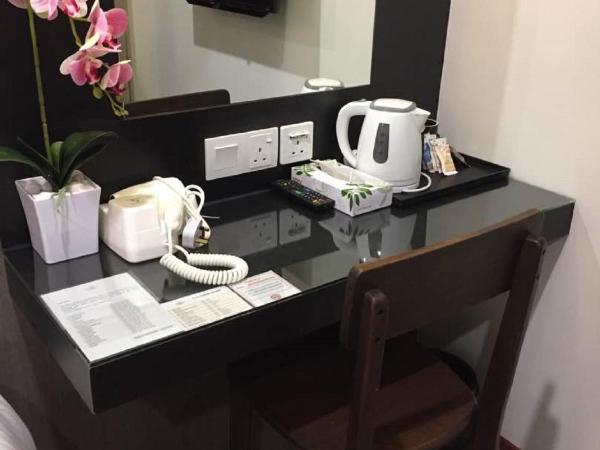 Meriton Inn : photo 4 de la chambre chambre lits jumeaux Économique