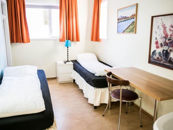 Igdlo Guesthouse : photo 2 de la chambre chambre lits jumeaux avec salle de bains commune