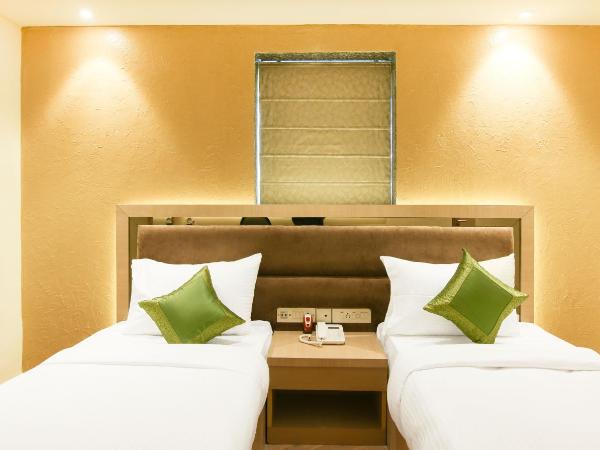 Treebo Hoops - Airport : photo 7 de la chambre [sanitized] deluxe double or twin room