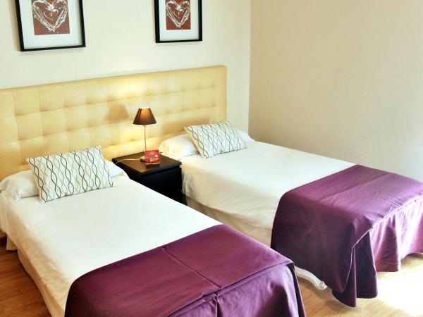 Aparthotel Encasa : photo 7 de la chambre chambre lits jumeaux