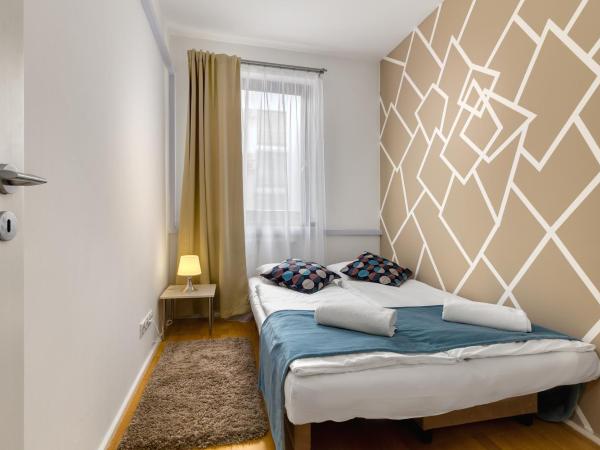 Quality Point Apartments : photo 3 de la chambre appartement 2 chambres avec balcon