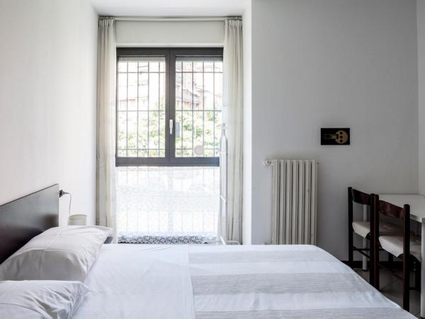 Bed & Breakfast Cesarina : photo 8 de la chambre chambre triple - vue sur jardin