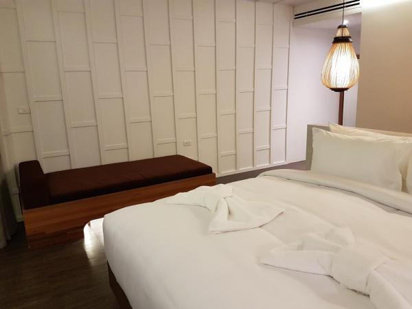 Whale Hua Hin - SHA Plus : photo 9 de la chambre chambre de luxe double ou lits jumeaux avec baignoire spa