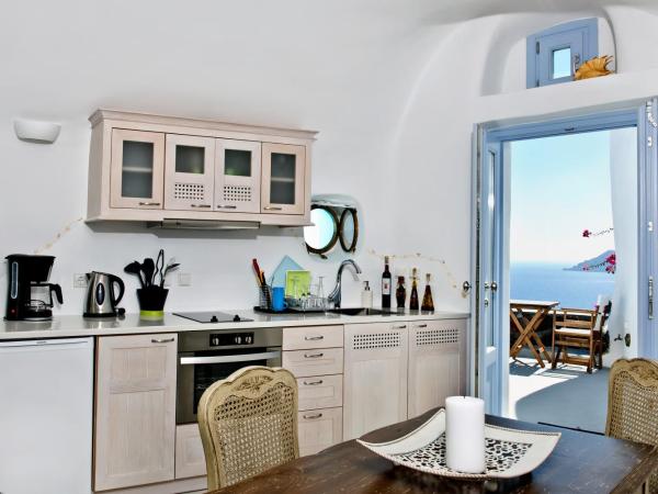 Anemomilos : photo 4 de la chambre villa avec piscine commune - vue sur caldeira