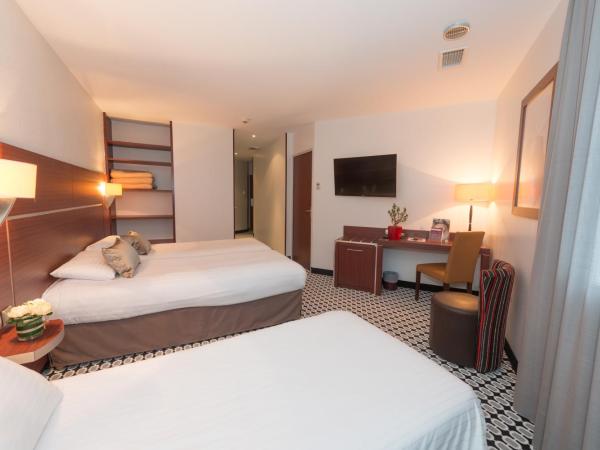Kyriad Limoges Centre Gare - Atrium : photo 4 de la chambre chambre triple supérieure (3 lits simples)