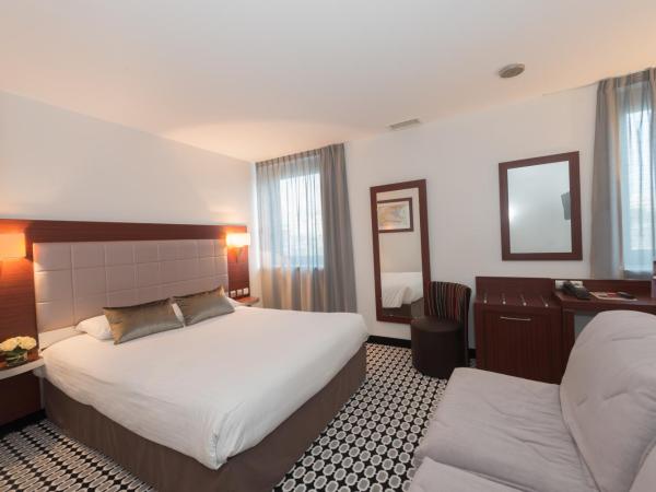 Kyriad Limoges Centre Gare - Atrium : photo 2 de la chambre chambre quadruple