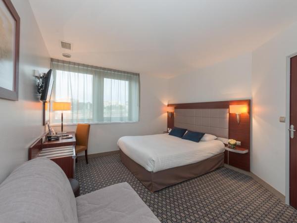 Kyriad Limoges Centre Gare - Atrium : photo 4 de la chambre chambre quadruple