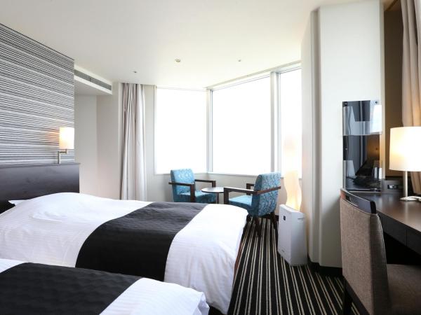 APA Hotel & Resort Tokyo Bay Makuhari : photo 3 de la chambre chambre lits jumeaux de luxe - fumeurs