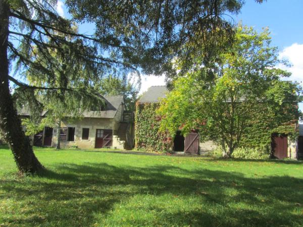 La Petite Charnasserie : photo 7 de la chambre chambre double ou lits jumeaux supérieure - vue sur jardin