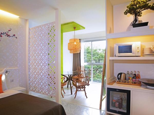 Sino House Phuket Hotel - SHA Plus : photo 7 de la chambre chambre quadruple exécutive