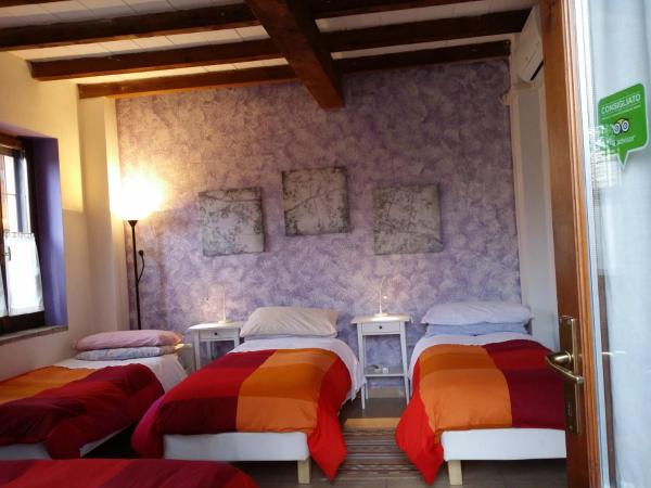 R&B Albero Cavo Parma : photo 2 de la chambre chambre quadruple