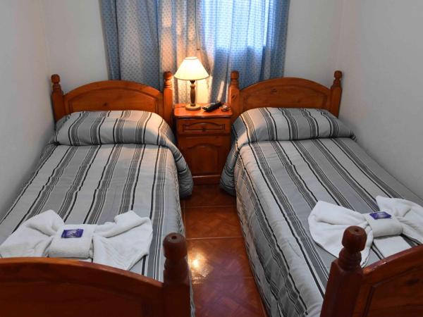 Residencial El Hogar : photo 5 de la chambre chambre lits jumeaux