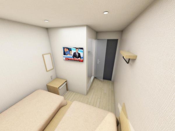 Artravel Myeongdong : photo 8 de la chambre chambre lits jumeaux avec salle de bains privative