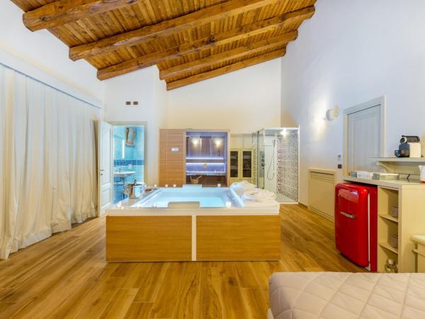 Hotel Sa Cheya Relais & Spa : photo 2 de la chambre suite lit king-size avec baignoire spa