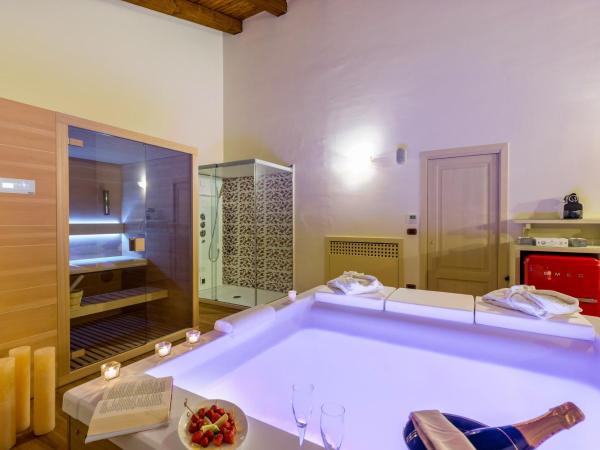 Hotel Sa Cheya Relais & Spa : photo 9 de la chambre suite lit king-size avec baignoire spa