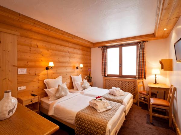 Hotel les Flocons : photo 1 de la chambre chambre double ou lits jumeaux standard