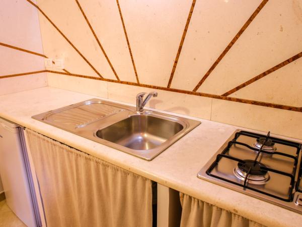 Marisal Accommodation : photo 3 de la chambre appartement avec terrasse