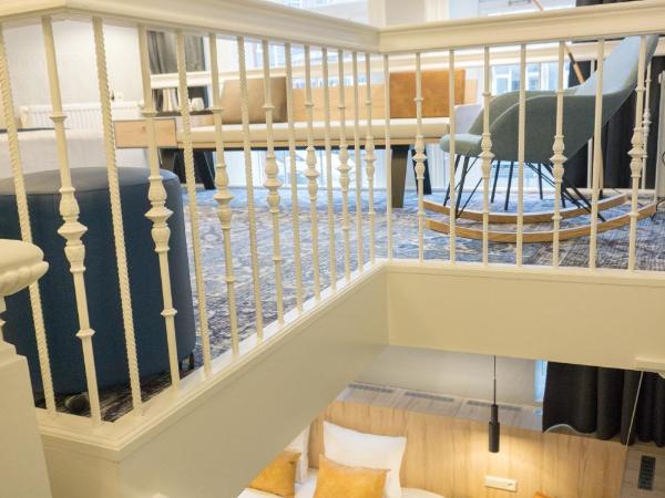 Hotel Nes : photo 3 de la chambre chambre quadruple deluxe - vue sur canal