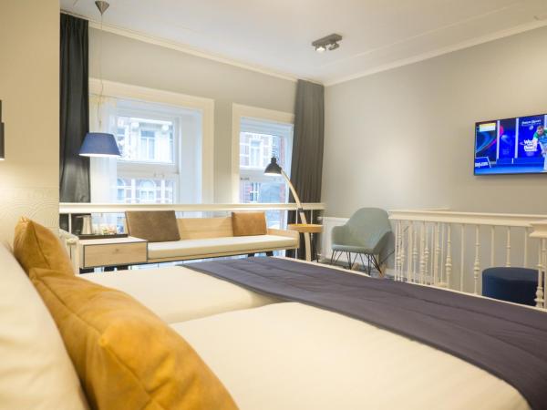 Hotel Nes : photo 2 de la chambre chambre quadruple deluxe - vue sur canal