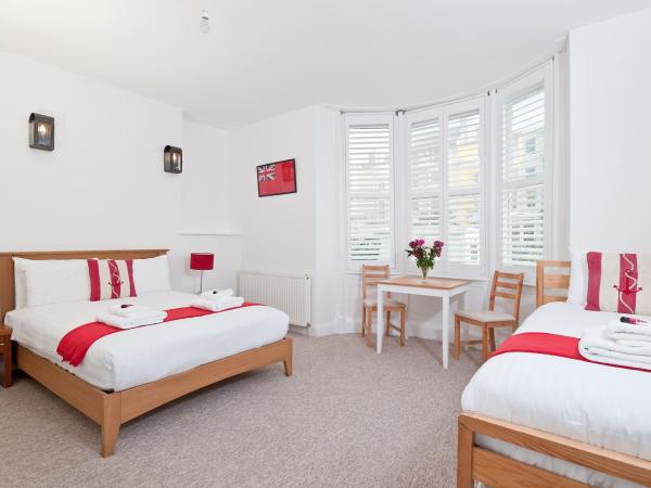 Hamptons Brighton : photo 1 de la chambre chambre familiale - vue sur mer