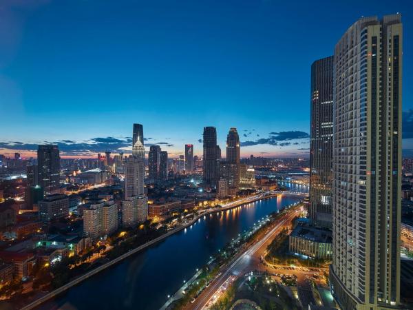 Shangri-La Tianjin : photo 5 de la chambre chambre lit king-size de luxe - vue sur rivière