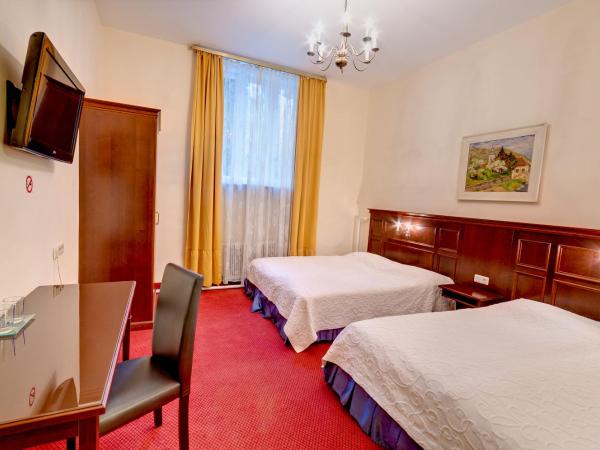 Hotel Viktoria Schönbrunn : photo 4 de la chambre chambre quadruple
