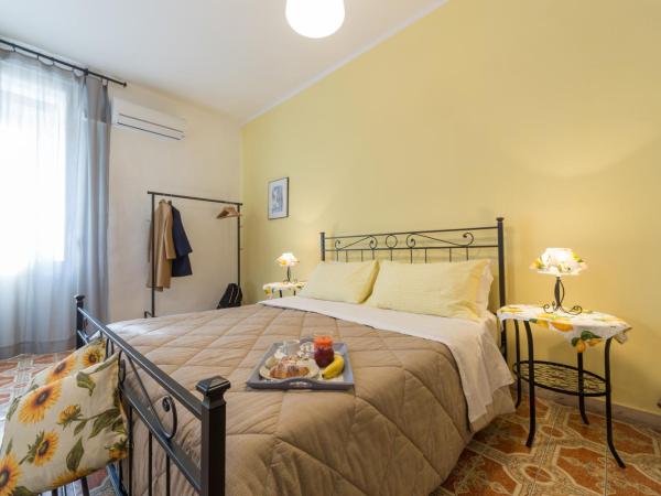 Catania Inn Rooms : photo 6 de la chambre chambre quadruple avec balcon 