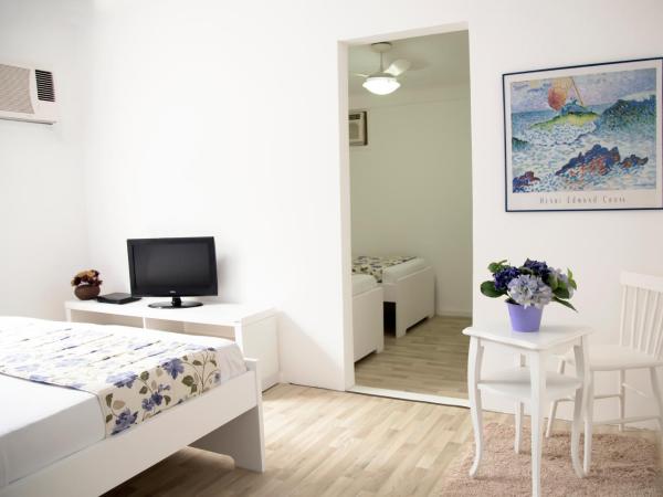 Hospedaria Entre Amigos : photo 3 de la chambre suite familiale