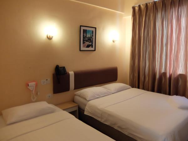 YaJu Hotel : photo 1 de la chambre chambre triple deluxe