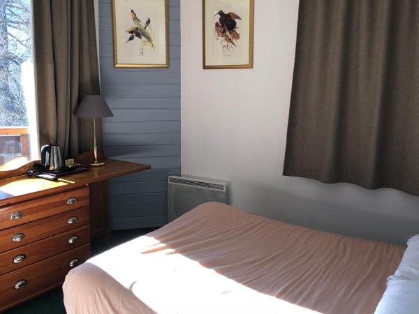 Hôtel Les Trappeurs : photo 4 de la chambre chambre triple