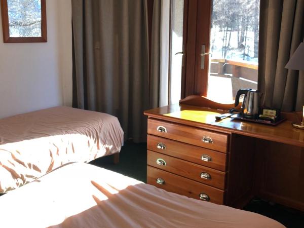 Hôtel Les Trappeurs : photo 3 de la chambre chambre triple